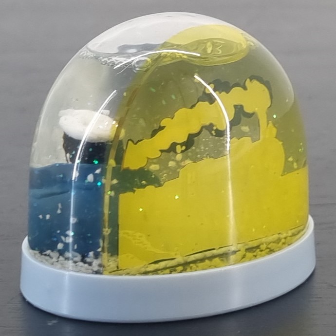 Corto Maltese snowglobe - Demons et Merveilles _left back - Demons & Merveilles Corto Maltese snowglobe - Demons et Merveilles _left back