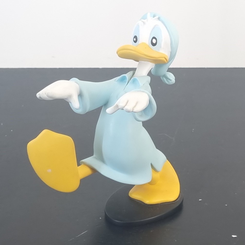 Donald Duck sleepwalking figurine